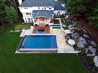 Landscape and swimming pool photo shot by a drone by Neave Group