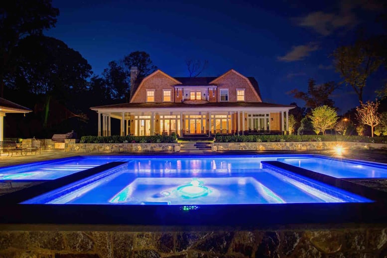 A landscaping project by Neave Pools photographed at night