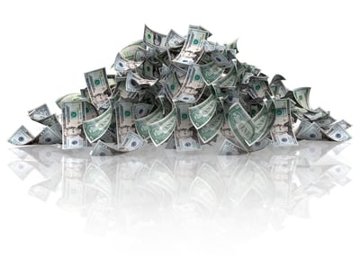 Pile of dollars - isolated over a white background.jpeg
