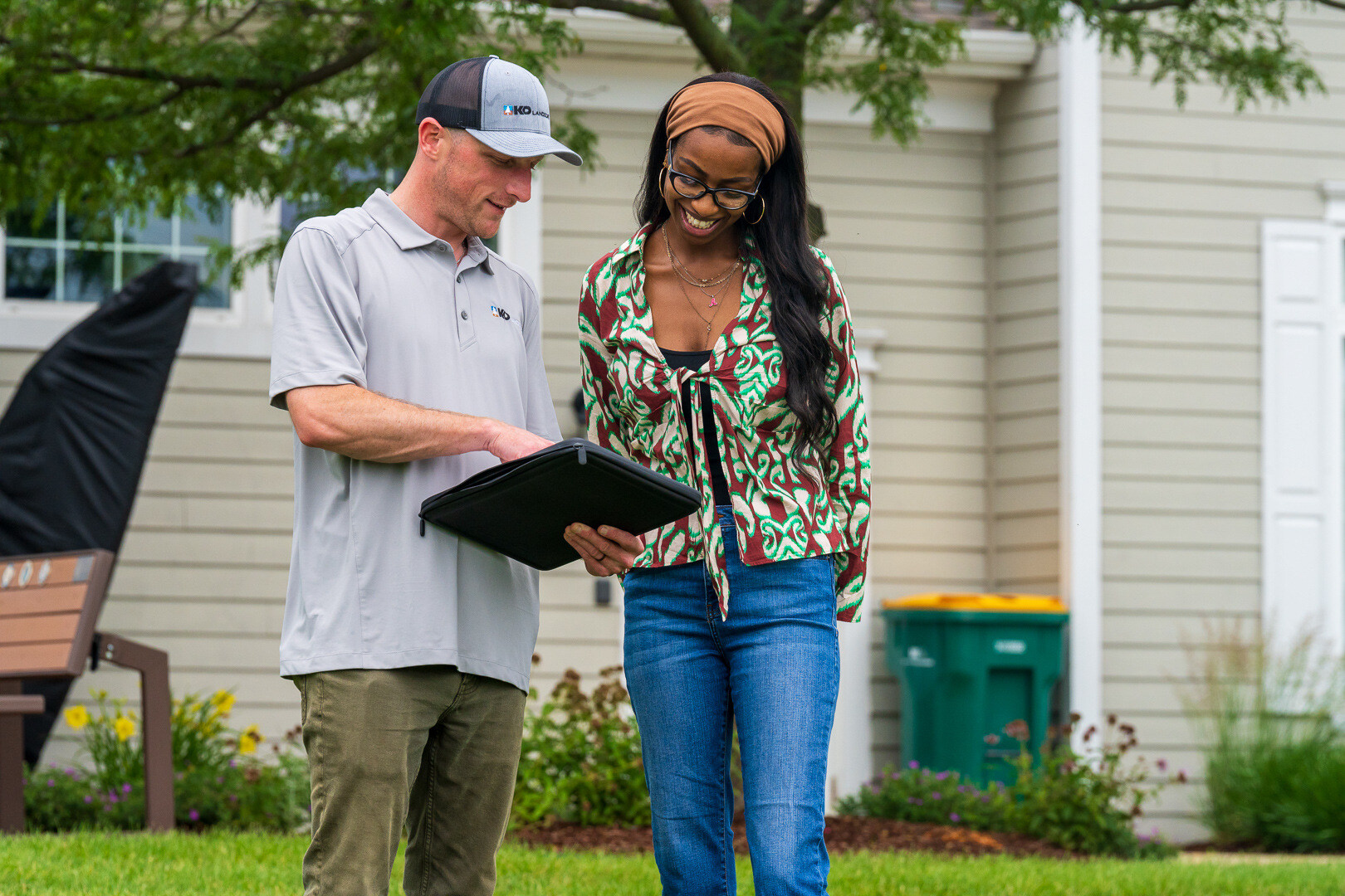 commercial HOA account manager and property manager customer reviewing inspecting a property 21