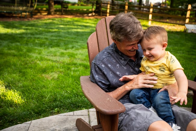 lawn care customer with child - oasis